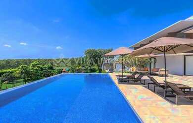 Imagem: A casa em condomínio à venda possui 5 Dormitórios, 5 Banheiros