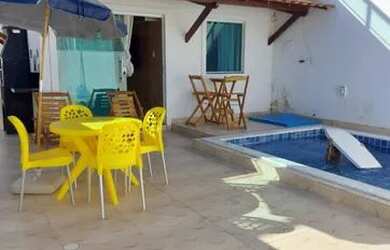 Imagem: A casa possui 2 Dormitórios, 2 Banheiros, 1 Vaga na garagem