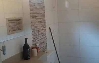 Imagem: A casa possui 3 Dormitórios, 2 Banheiros e está localizado