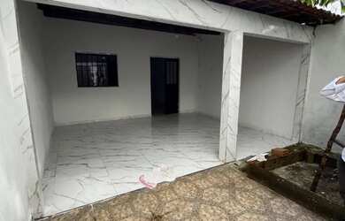 Imagem: A casa possui 3 Dormitórios, 2 Banheiros e 2 Vagas na garagem