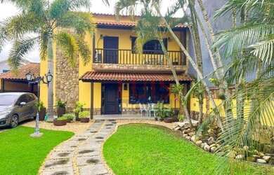 Imagem: A casa em condomínio possui 5 Dormitórios, 5 Banheiros, 1