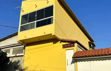 Imagem: A casa possui 3 Dormitórios, 3 Banheiros, 3 Vagas na garagem