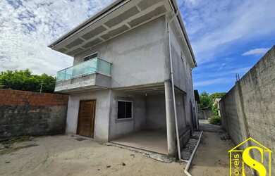 Imagem: A casa possui 2 Dormitórios, 3 Banheiros, 2 Vagas na garagem