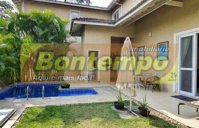 Imagem: A casa possui 5 Dormitórios, 5 Banheiros, 5 Vagas na garagem