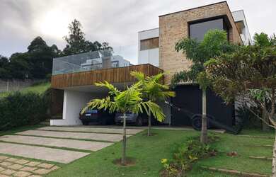 Imagem: A casa em condomínio possui 3 Dormitórios, 4 Banheiros, 5