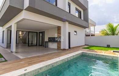 Imagem: A casa em condomínio possui 4 Dormitórios, 5 Banheiros, 4