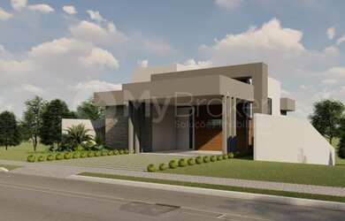 Imagem: A casa possui 3 Dormitórios, 5 Banheiros, 4 Vagas na garagem