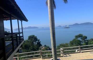 Imagem: A casa possui 5 Dormitórios, 5 Banheiros, 5 Vagas na garagem