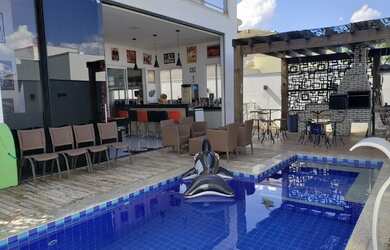 Imagem: A casa em condomínio possui 4 Dormitórios, 4 Banheiros, 4