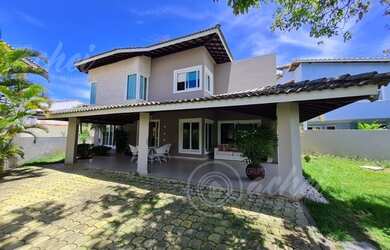 Imagem: A casa possui 4 Dormitórios, 5 Banheiros, 4 Vagas na garagem