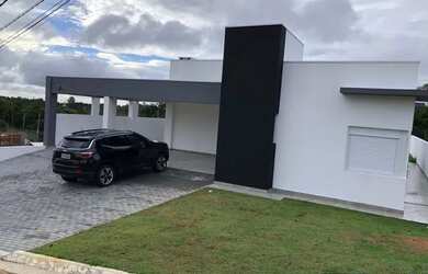 Imagem: A casa possui 3 Dormitórios, 5 Banheiros, 2 Vagas na garagem