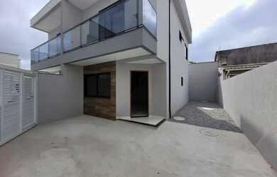 Imagem: A casa possui 2 Dormitórios, 3 Banheiros, 1 Vaga na garagem