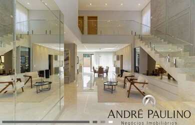 Imagem: A casa em condomínio possui 4 Dormitórios, 4 Banheiros, 370m²