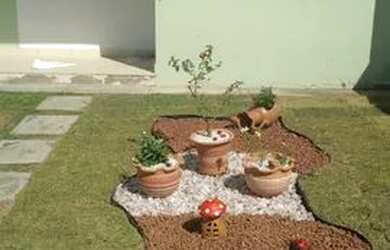 Imagem: A casa em condomínio possui 3 Dormitórios, 2 Banheiros e