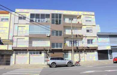 Imagem: O apartamento possui 2 Dormitórios, 1 Banheiro, 2 Vagas na