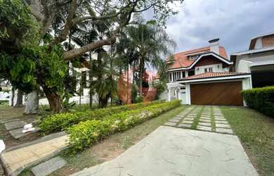 Imagem: A casa em condomínio possui 4 Dormitórios, 5 Banheiros, 5