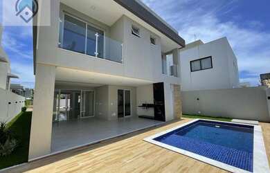 Imagem: A casa em condomínio possui 4 Dormitórios, 5 Banheiros, 2