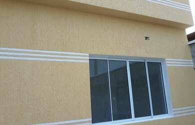 Imagem: A casa possui 2 Dormitórios, 1 Banheiro, 2 Vagas na garagem