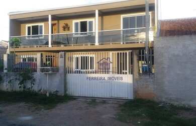 Imagem: A casa possui 4 Dormitórios, 3 Banheiros, 5 Vagas na garagem