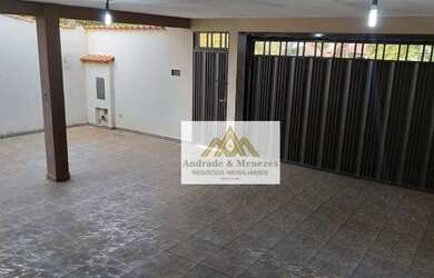 Imagem: A casa possui 3 Dormitórios, 2 Banheiros, 4 Vagas na garagem