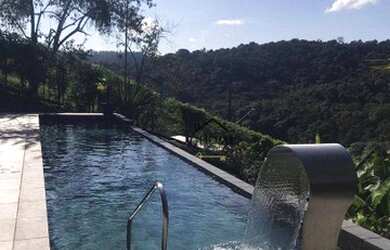 Imagem: A casa em condomínio possui 5 Dormitórios, 5 Banheiros, 4