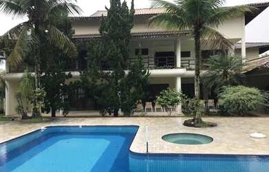 Imagem: A casa possui 5 Dormitórios, 5 Banheiros, 5 Vagas na garagem