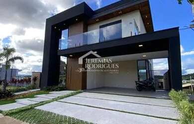 Imagem: A casa em condomínio possui 4 Dormitórios, 4 Banheiros, 315m²