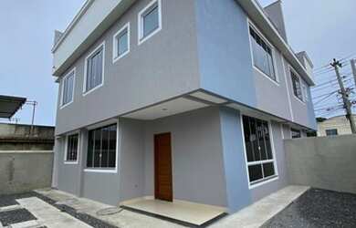 Imagem: A casa possui 3 Dormitórios, 3 Banheiros, 1 Vaga na garagem