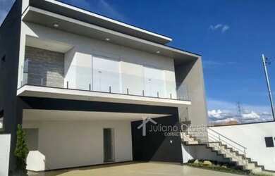 Imagem: A casa possui 3 Dormitórios, 4 Banheiros, 3 Vagas na garagem