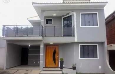 Imagem: A casa possui 3 Dormitórios, 3 Banheiros, 2 Vagas na garagem