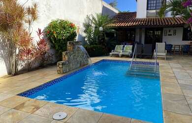 Imagem: A casa em condomínio possui 4 Dormitórios, 4 Banheiros, 4