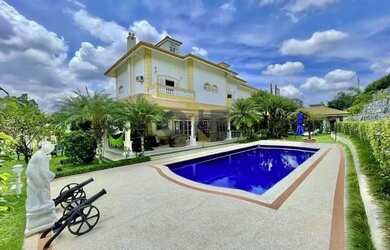 Imagem: A casa em condomínio possui 4 Dormitórios, 5 Banheiros, 5