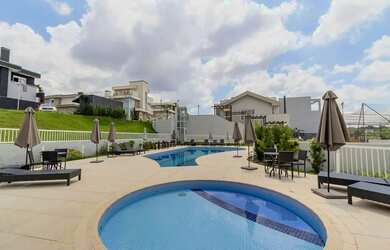 Imagem: A casa em condomínio possui 3 Dormitórios, 4 Banheiros, 1