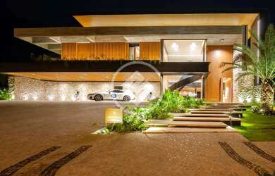 Imagem: A casa possui 5 Dormitórios, 5 Banheiros, 5 Vagas na garagem