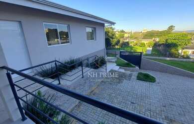 Imagem: A casa possui 3 Dormitórios, 2 Banheiros, 3 Vagas na garagem