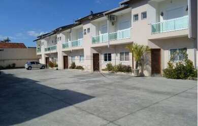 Imagem: A casa em condomínio possui 2 Dormitórios, 3 Banheiros, 2