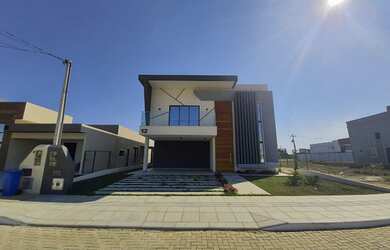 Imagem: A casa em condomínio possui 4 Dormitórios, 4 Banheiros, 4