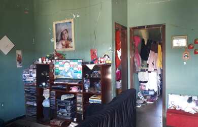 Imagem: A casa possui 3 Dormitórios, 1 Banheiro, 150m² de Área e