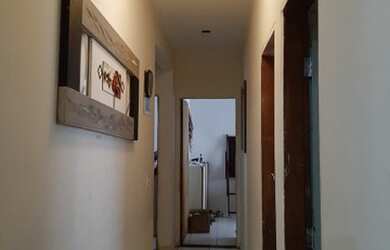 Imagem: A casa em condomínio possui 4 Dormitórios, 2 Banheiros e 243m²