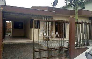 Imagem: A casa possui 3 Dormitórios, 2 Banheiros, 2 Vagas na garagem