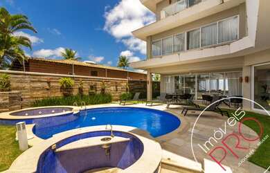 Imagem: A casa possui 5 Dormitórios, 5 Banheiros, 5 Vagas na garagem