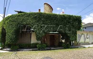 Imagem: A casa possui 5 Dormitórios, 5 Banheiros, 5 Vagas na garagem