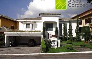 Imagem: A casa em condomínio possui 4 Dormitórios, 5 Banheiros, 4