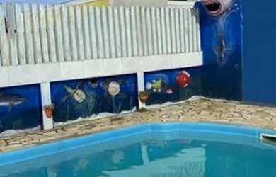 Imagem: A casa possui 3 Dormitórios, 3 Vagas na garagem e está localizado