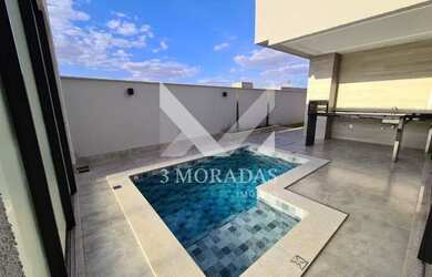 Imagem: A casa possui 3 Dormitórios, 3 Banheiros, 4 Vagas na garagem