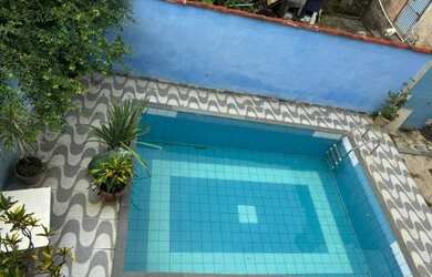 Imagem: A casa possui 2 Dormitórios, 4 Banheiros, 1 Vaga na garagem