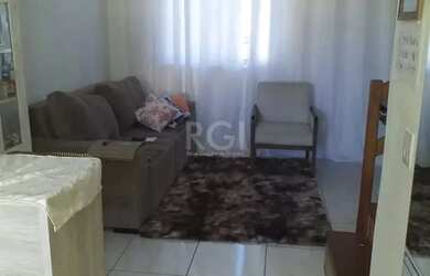 Imagem: A casa à venda possui 2 Dormitórios, 2 Banheiros, 1 Vaga na