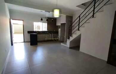 Imagem: A casa possui 3 Dormitórios, 4 Banheiros, 2 Vagas na garagem