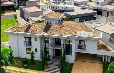 Imagem: A casa em condomínio possui 4 Dormitórios, 5 Banheiros, 2