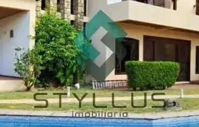 Imagem: A casa possui 4 Dormitórios, 5 Banheiros, 5 Vagas na garagem